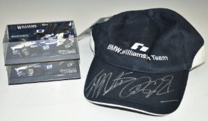 Two signed Minichamps Formula 1 Williams model cars, one signed by Juan Pablo Montoya, the other