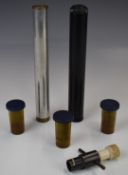 Three 12 bore shotgun chokes together with a choke key and two air rifle sound moderators.