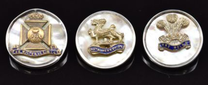 Three mother of pearl and enamel sweetheart brooches for the Wiltshire Regiment, Welch Regiment