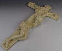 A signed pottery crucifix, width 40 x height 69cm