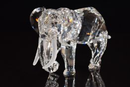 Swarovski Crystal glass elephant with frosted tusks, 8.5cm tall.