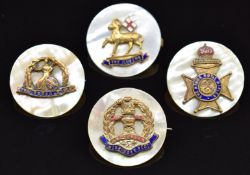Four mother of pearl, metal and enamel sweetheart brooches for the Middlesex Regiment, The Queen'