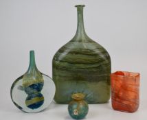 Four pieces of Mdina and similar glassware comprising a lolipop vase signed 'Mdina', an orange