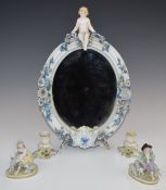 Volkstadt figural mirror with easel back, height 37cm, a pair of continental figures and a pair of