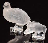Two Lalique clear and frosted glass animal paperweights, one wild boar the other a partridge, both
