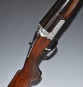 SKB 12 bore side by side ejector shotgun with engraved lock, trigger guard, underside, top plate and