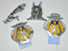 Four car badges and mascots comprising Jaguar mascot, length 12cm, Rover Viking badge and two AA