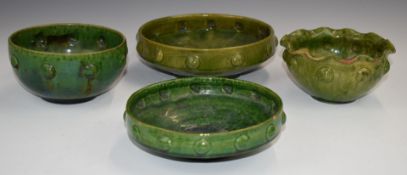 Farnham Art Pottery four pedestal dishes with cabochon style decoration, largest diameter 20cm