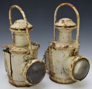 Two British Railways Midland region steam railway locomotive or similar hand lamps with brackets
