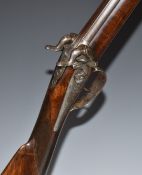 Rossi Italian double barrelled over and under percussion hammer action gun with engraved locks,