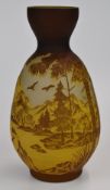 Gallé style cameo glass vase decorated with an extensive mountain and lake scene in brown and yellow