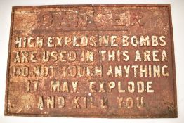 WW1 era cast iron warning sign 'Danger High Explosive Bombs are used in this area. Do not touch