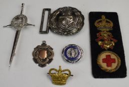Queen Alexandra's Royal Naval Nursing Service cloth and bullion rank badge, belt buckle, brooch etc