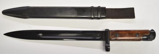 Continental bayonet stamped 2235 to wooden grips, with 25cm fullered blade. PLEASE NOTE ALL BLADED