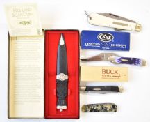 Four folding pocket knives comprising CX Lockwood Brothers, Buck, Care and a DRP example, longest