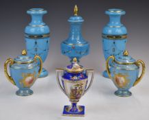 Pair of Coalport covered twin handled pedestal vases with flower decoration, a Vienna covered vase