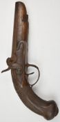 Percussion hammer action pocket pistol with 'Charles' engraved to the lock, chequered grip, carved