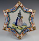 Henri Quimper star plaque, diameter 24cm
