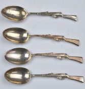 Set of four novelty hallmarked silver teaspoons, the handles formed as Lee Enfield or similar