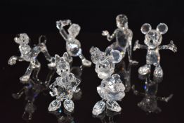 Six Swarovski Crystal Disney clear and coloured glass figures comprising Mickey Mouse, Minnie Mouse,