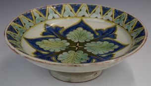 Della Robbia art / studio pottery tazza with geometric floral decoration, signed by John Fogo,