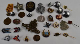 Approximately thirty two badges and buttons including SAS Parachute Regiment, Royal Marines etc