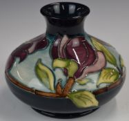 Moorcroft squat pedestal vase decorated with flowers, height 12cm