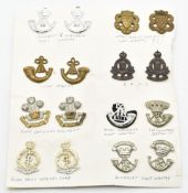 Seven sets of British Army collar badges including Somerset Light Infantry, RAOC, Light Infantry,