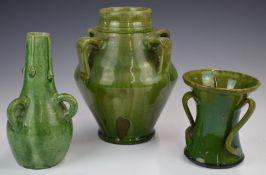 Farnham Art Pottery three vases with looped / wrythen handles, tallest 21cm
