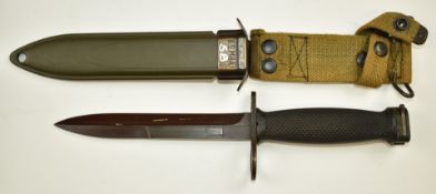 American M7 bayonet with 16cm blade, cross guard stamped US M7, M8 scabbard and belt attachments.