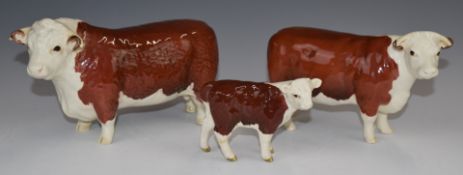 Beswick Hereford bull, cow and calf, tallest 11.5cm