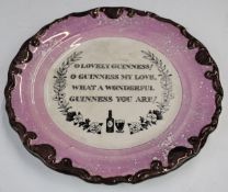 Carltonware Guinness plate in the manner of Sunderland lustre, with inscription to centre, 20cm