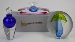 Three pieces of studio glass comprising Graham Muir Hot Glass scent bottle in original box, a