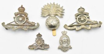 Five British Army Royal Artillery badges including hallmarked silver sweetheart brooch, First