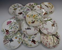 Fourteen Minton plates decorated with flora and fauna, diameter 23cm