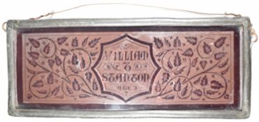 18thC ruby glass memorial plaque with etched decoration 'William T Stanton aged 17', in pewter