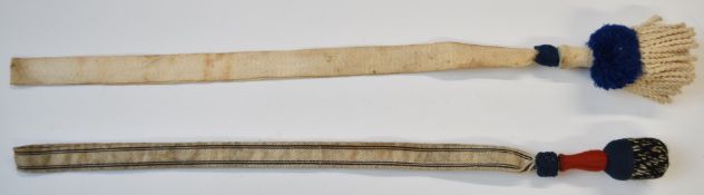 Two German bayonet knots comprising one WW1 blue wool example the other WW2 black and red wool, both