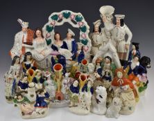 Collection of Staffordshire figures and spill vases including Richard III, Robin Hood, Dick