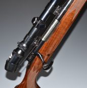 Winchester model 70 .308 bolt-action rifle with chequered semi-pistol grip and forend, raised