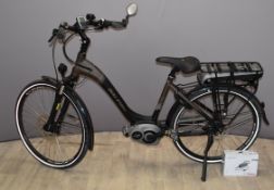 Raleigh Motus electric bicycle, the frame marked 18