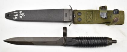 German Cold War bayonet for G3 rifle with 7/4/77 to handle, a 16.5cm blade, scabbard and frog.