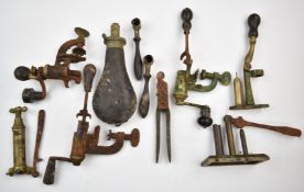 Ten various shotgun cartridge re-loading and shooting related tools and accessories including
