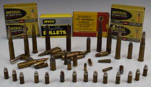 A collection of various rifle cartridges including .22, 7.62, 7x57, Kynoch .275 Magnum Rimless