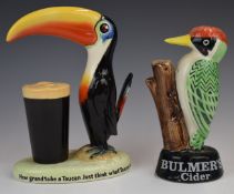 Carltonware Guinness toucan and Bulmer's cider woodpecker advertising figures, tallest 22cm