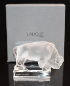 Lalique frosted and clear glass Bison paperweight, 1180600, signed 'Lalique France', 13cm long, in