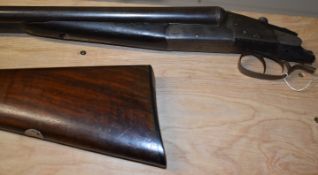 Holland & Holland side by side ejector shotgun with named locks, all over border engraving,
