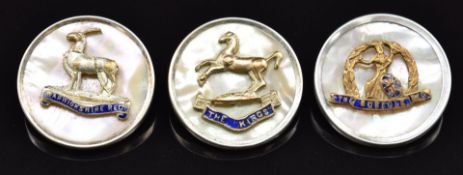 Three mother of pearl and enamel sweetheart brooches for the Suffolk Regiment, The King's Regiment