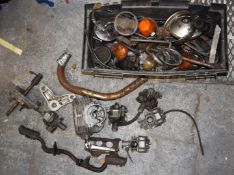 Box of Honda CB125 motorcycle parts including carburettors etc