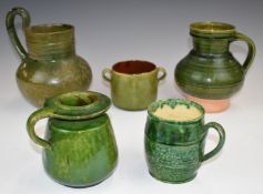 Farnham Art Pottery collection of jugs and tankards including one with leaf decoration, tallest