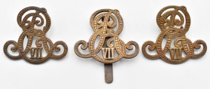 Three Army Recruiter Edward VII cipher metal cap badges, two with loops, the other with slider